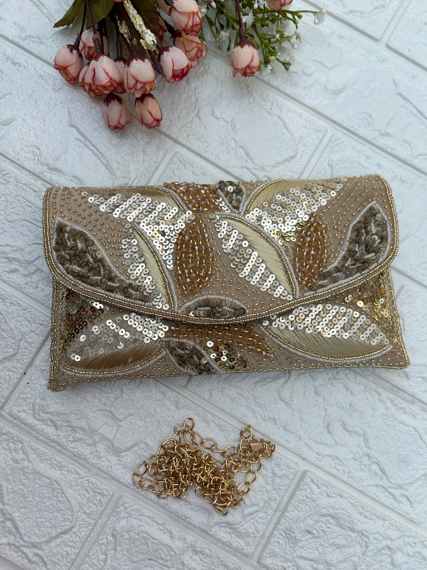 Peacock clutch
